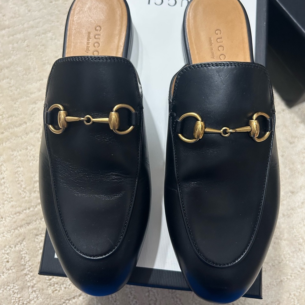 Gucci Black Leather Mules with Gold Bit Detail